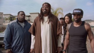 Slink Johnson (center) as the titular dark savior with, from left, Corey Holcomb, Andrew Bachelor, Kali Hawk and Andra Fuller, Thursdays on Adult Swim.