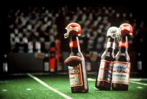 Anheuser-Busch's public comments on current issues in the NFL are laudable, but what about the connection between booze and domestic violence?