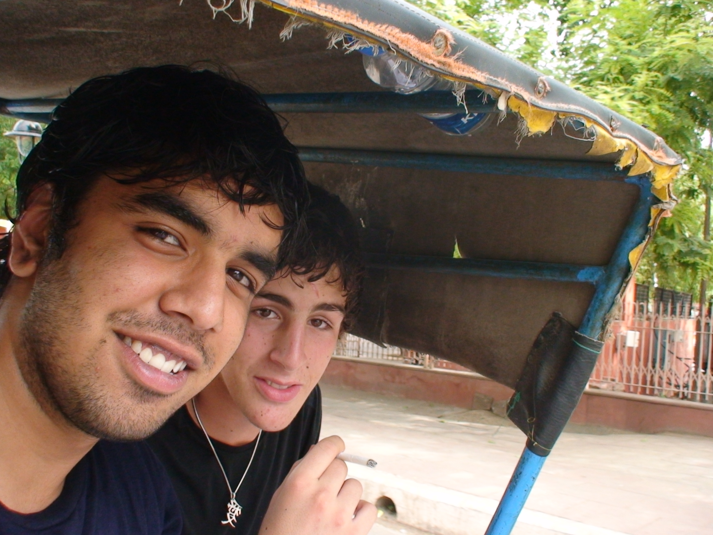 My friend and I are in the rickshaw just before smoking with the priests